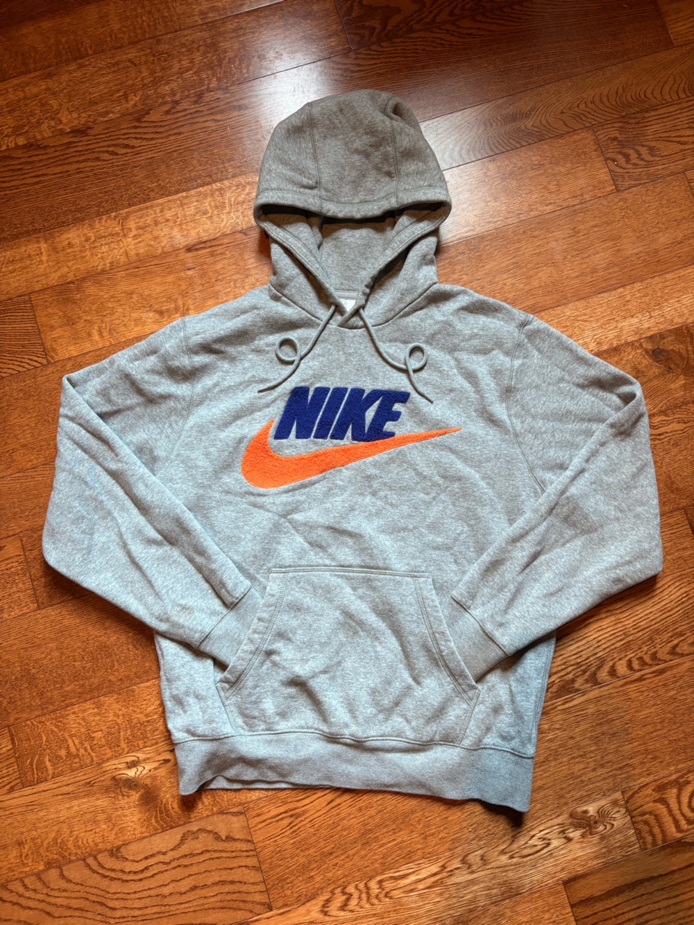 Nike Gray Hoodie with Orange Swoosh and Blue Logo